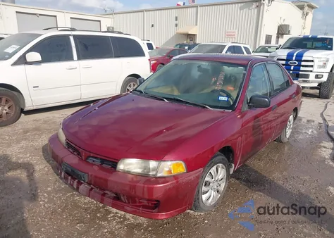 2000 Mitsubishi Mirage De z USA, uszkodzony, nr VIN JA3AY26C8YU012118